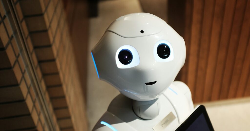 white robot near brown wall